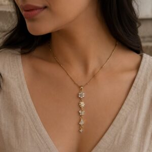 The Fiora Cascade Necklace 18K Gold Plated Anti-Tarnish Floral Butterfly CZ Pendant