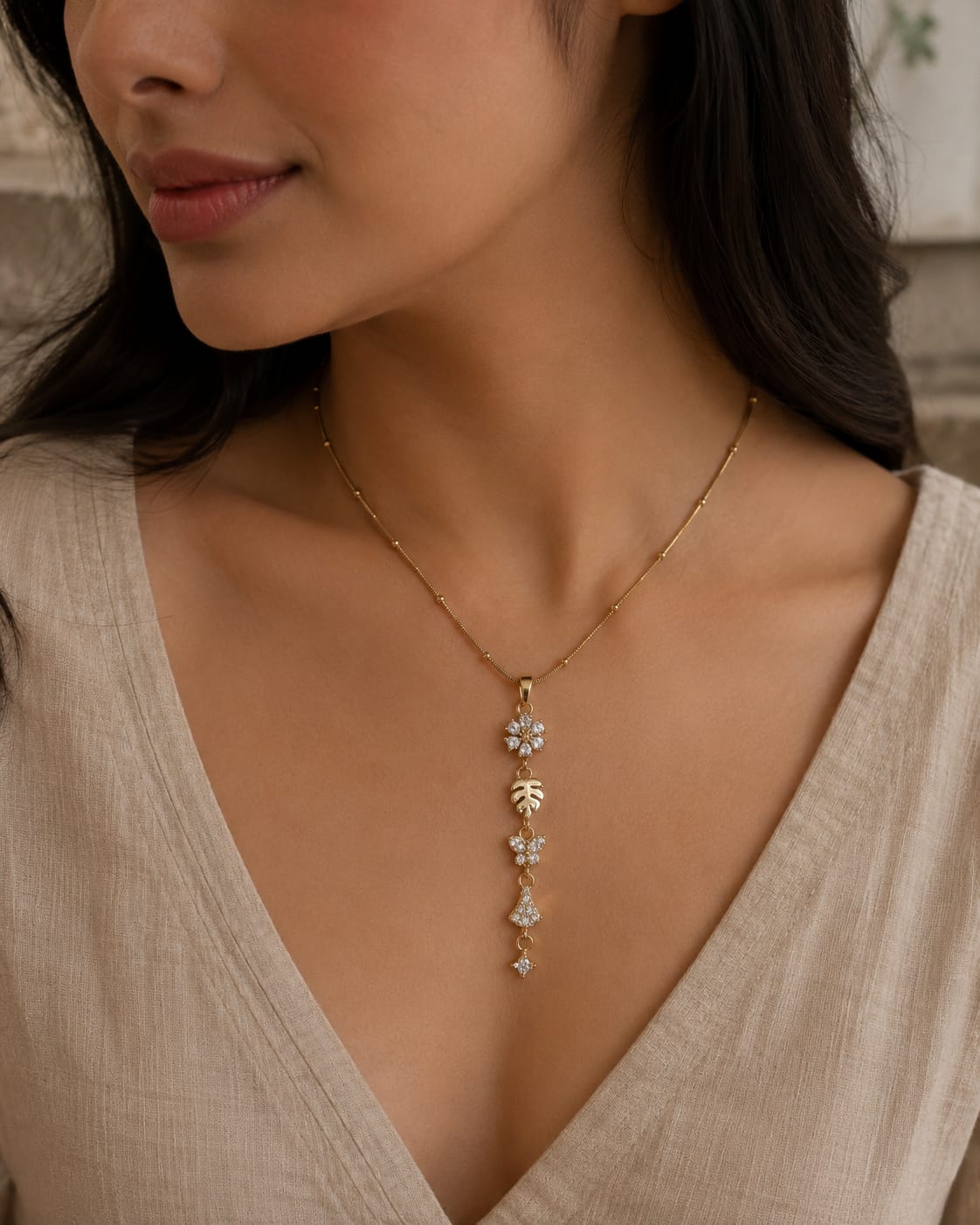 The Fiora Cascade Necklace 18K Gold Plated Anti-Tarnish Floral Butterfly CZ Pendant